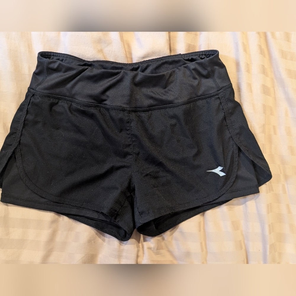 Black athletic shorts, Diadora brand, size small